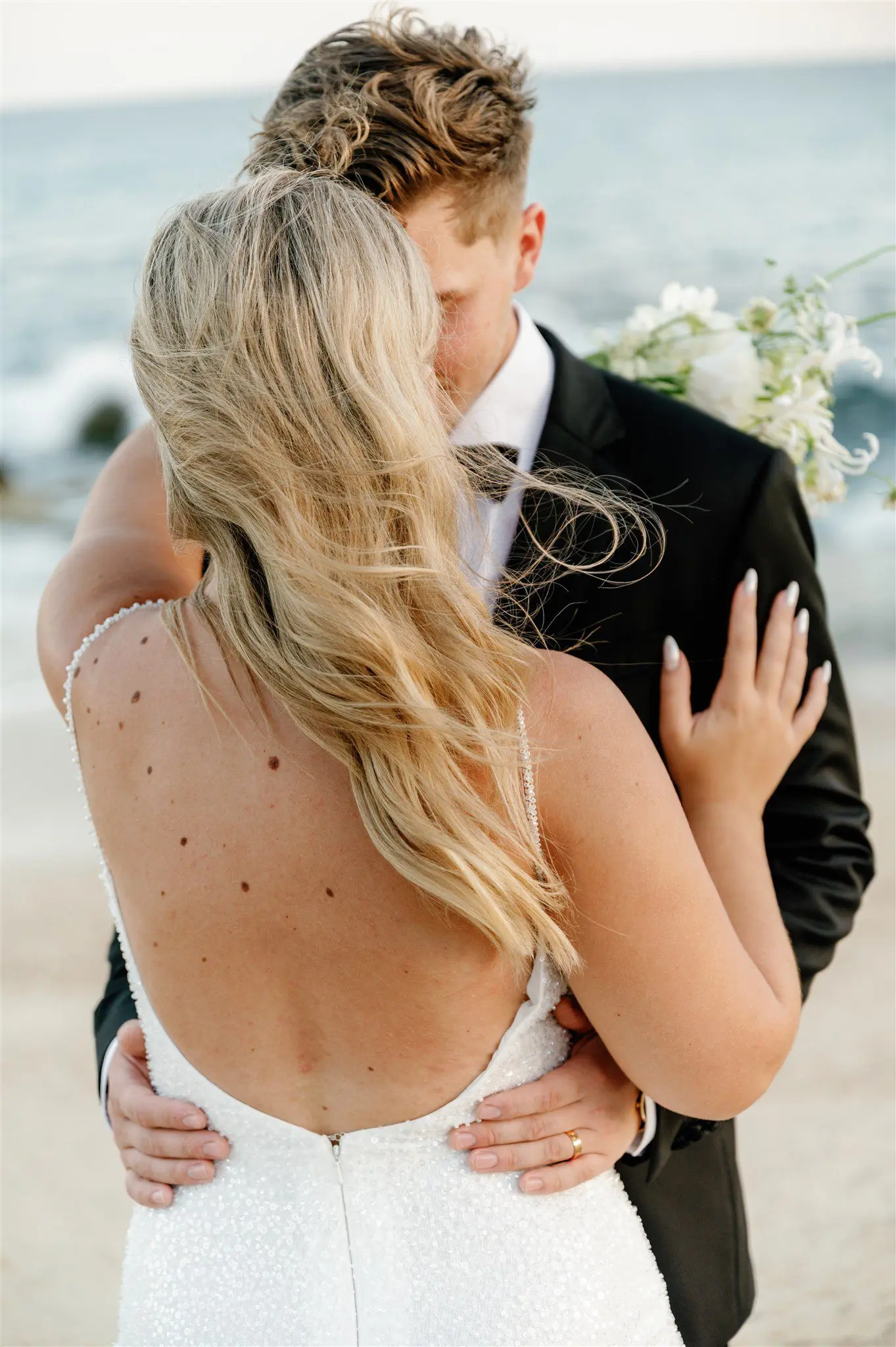 Bridal portraits at sunset on the beach in Cabo