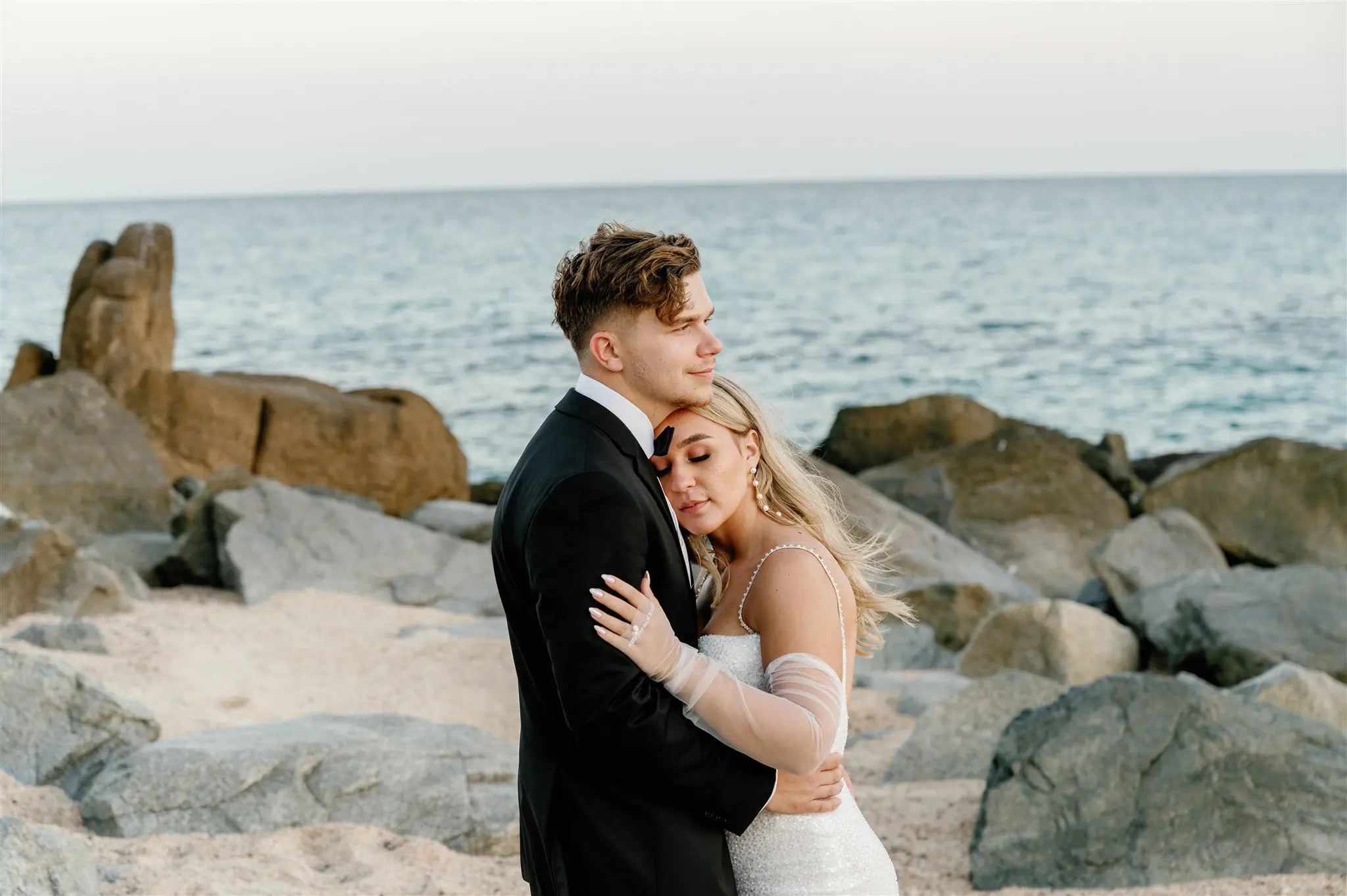 Bridal portraits on the beach at sunset