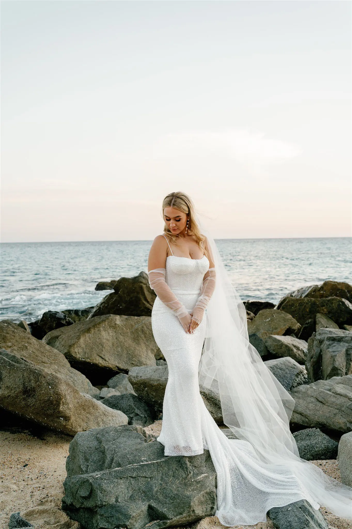 Bridal portraits at sunset on the beach in Cabo