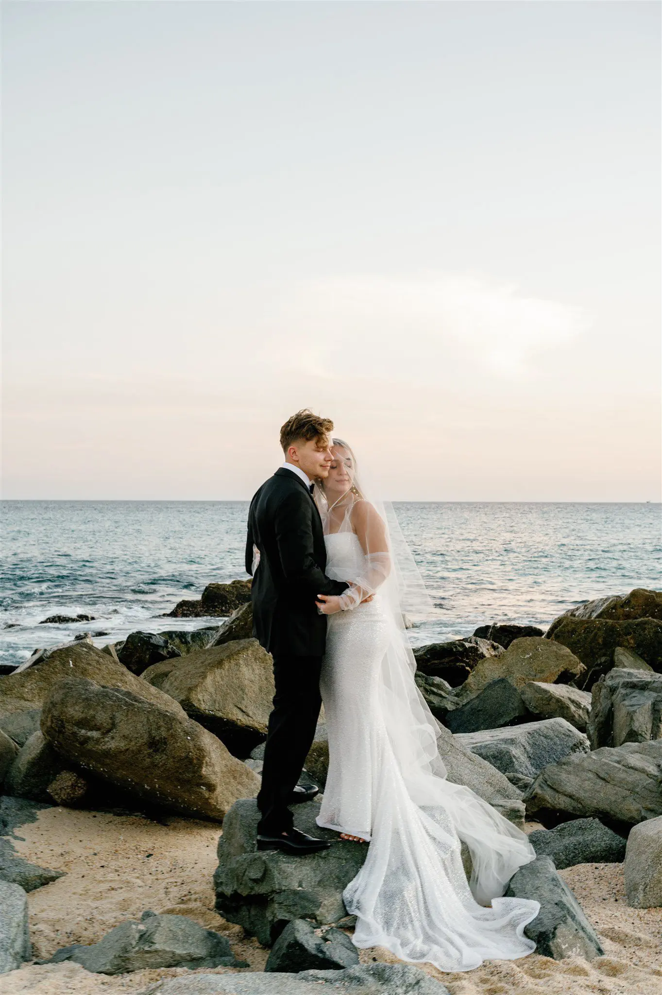 Bridal portraits on the beach at sunset