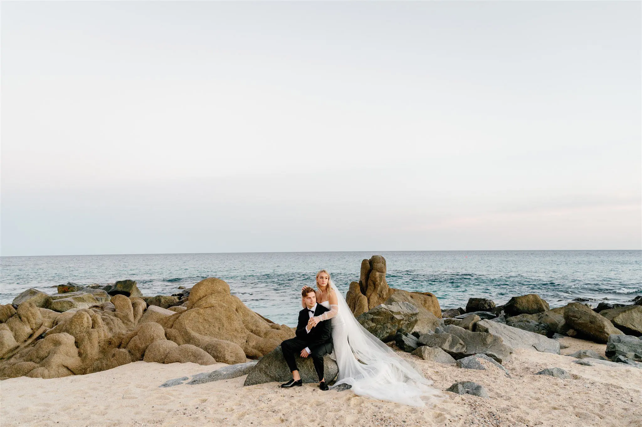 Bridal portraits on the beach at sunset