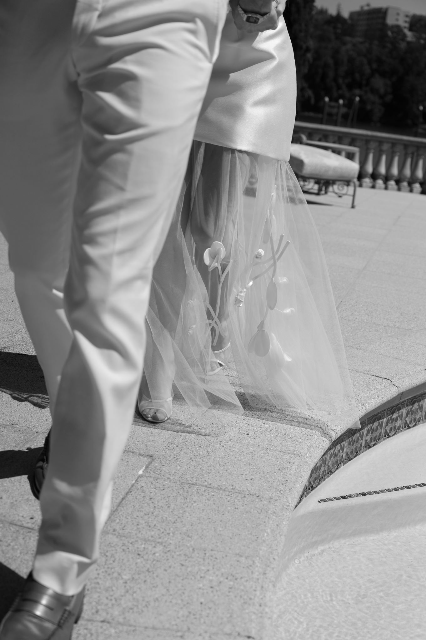 Detail shot of groom and bride