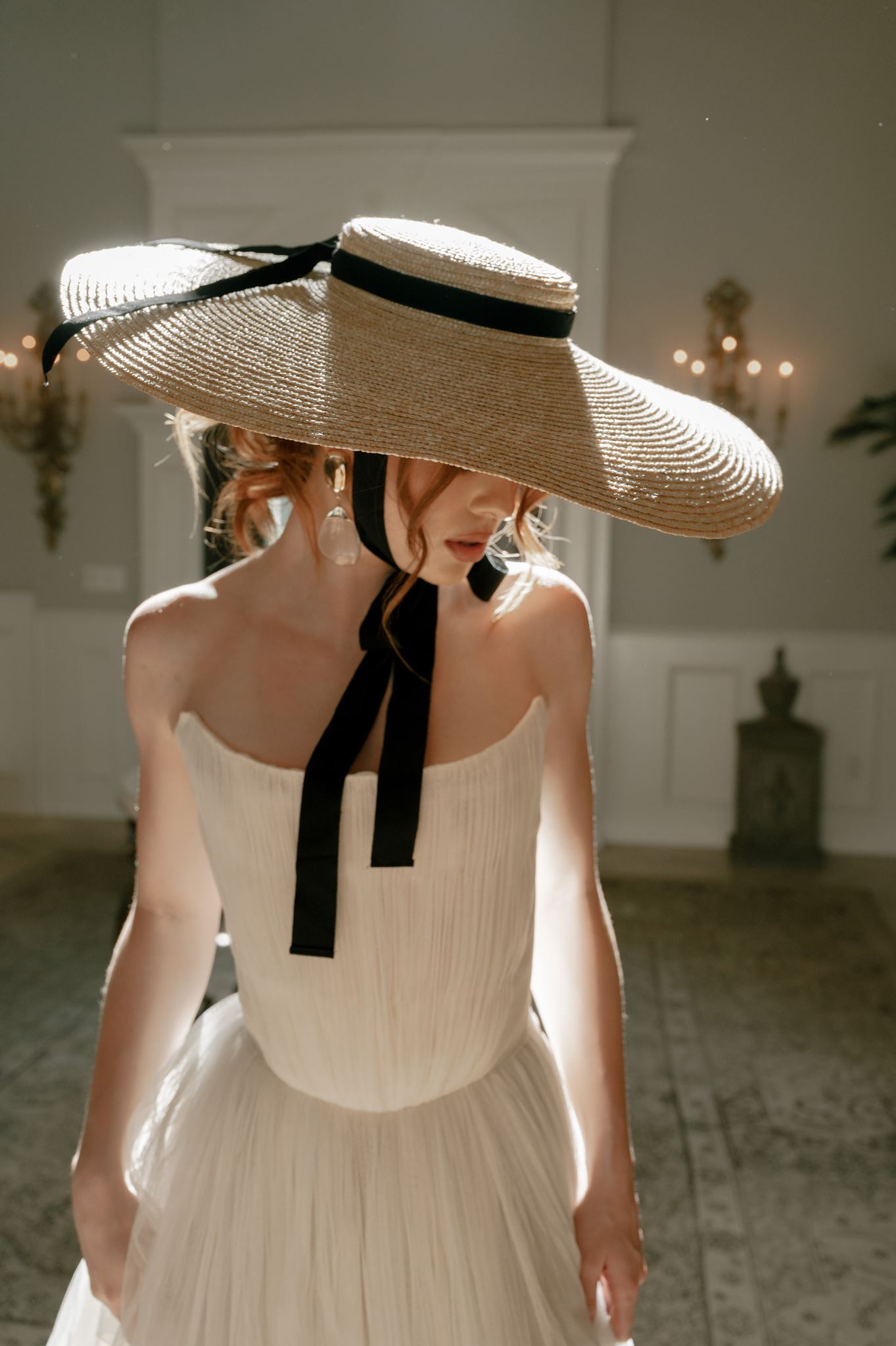 Bridal portrait in a wide-brimmed hat