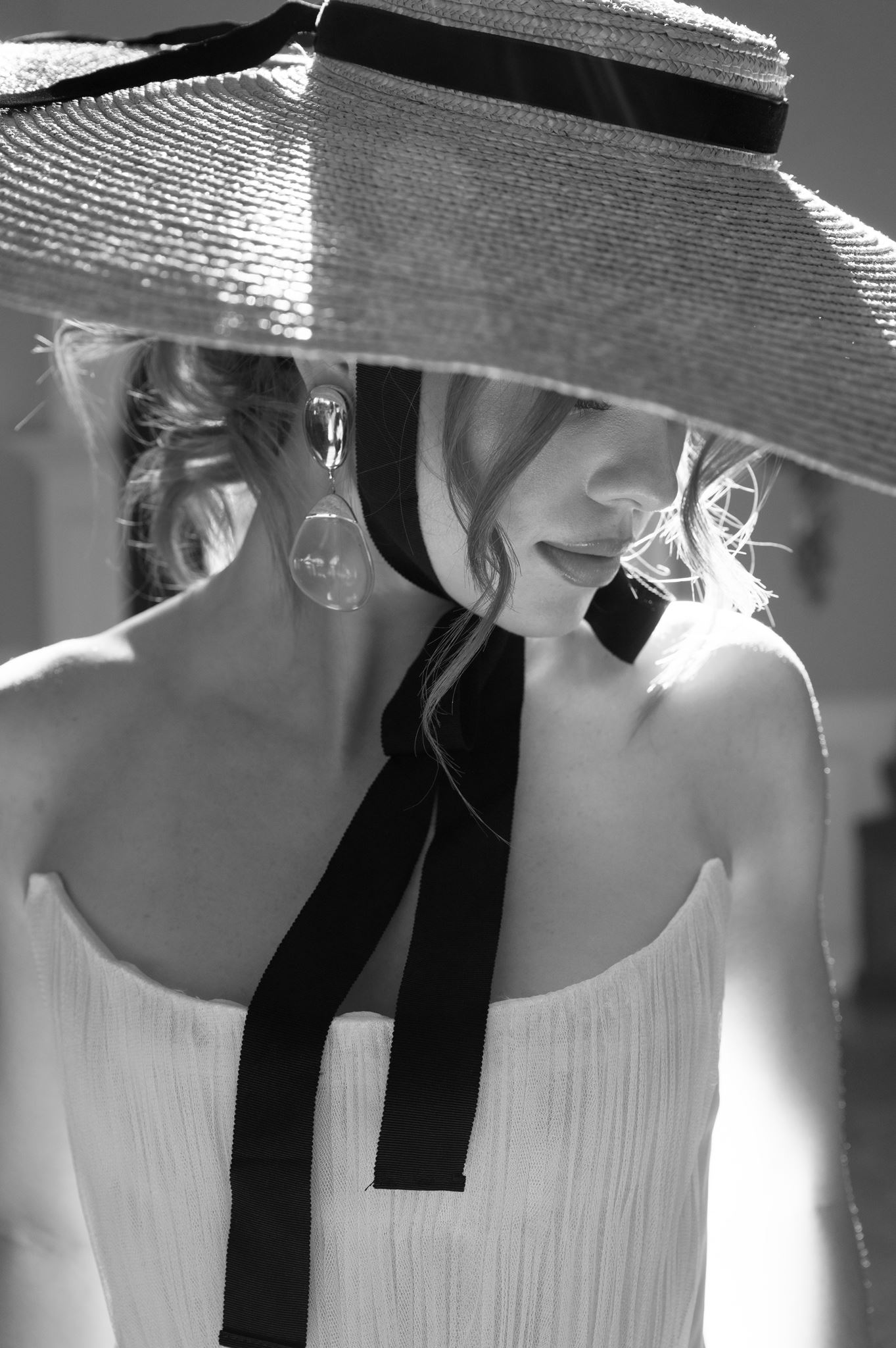 Close-up wedding bridal portrait with wide-brimmed hat
