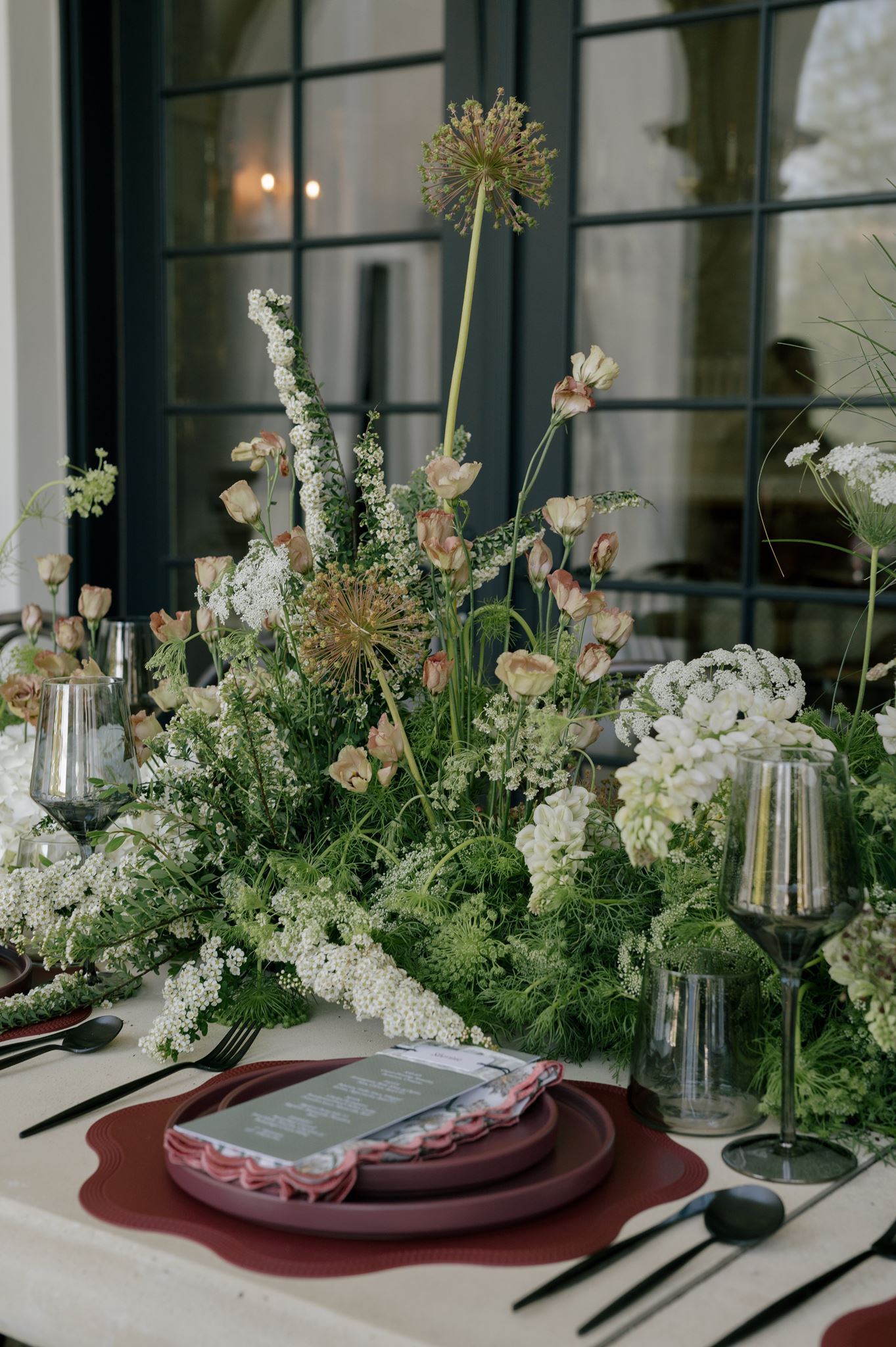 Elegant wedding tablescape with lush florals