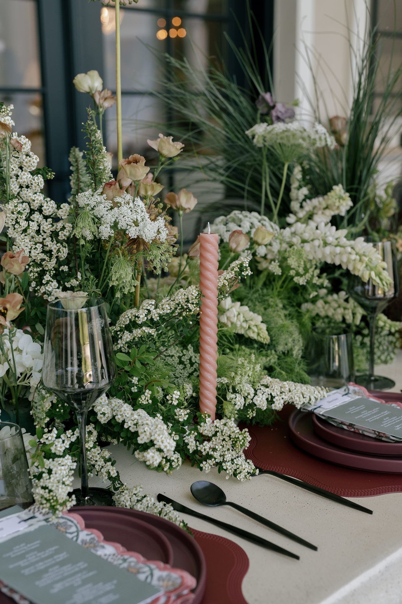 Elegant wedding tablescape with lush florals
