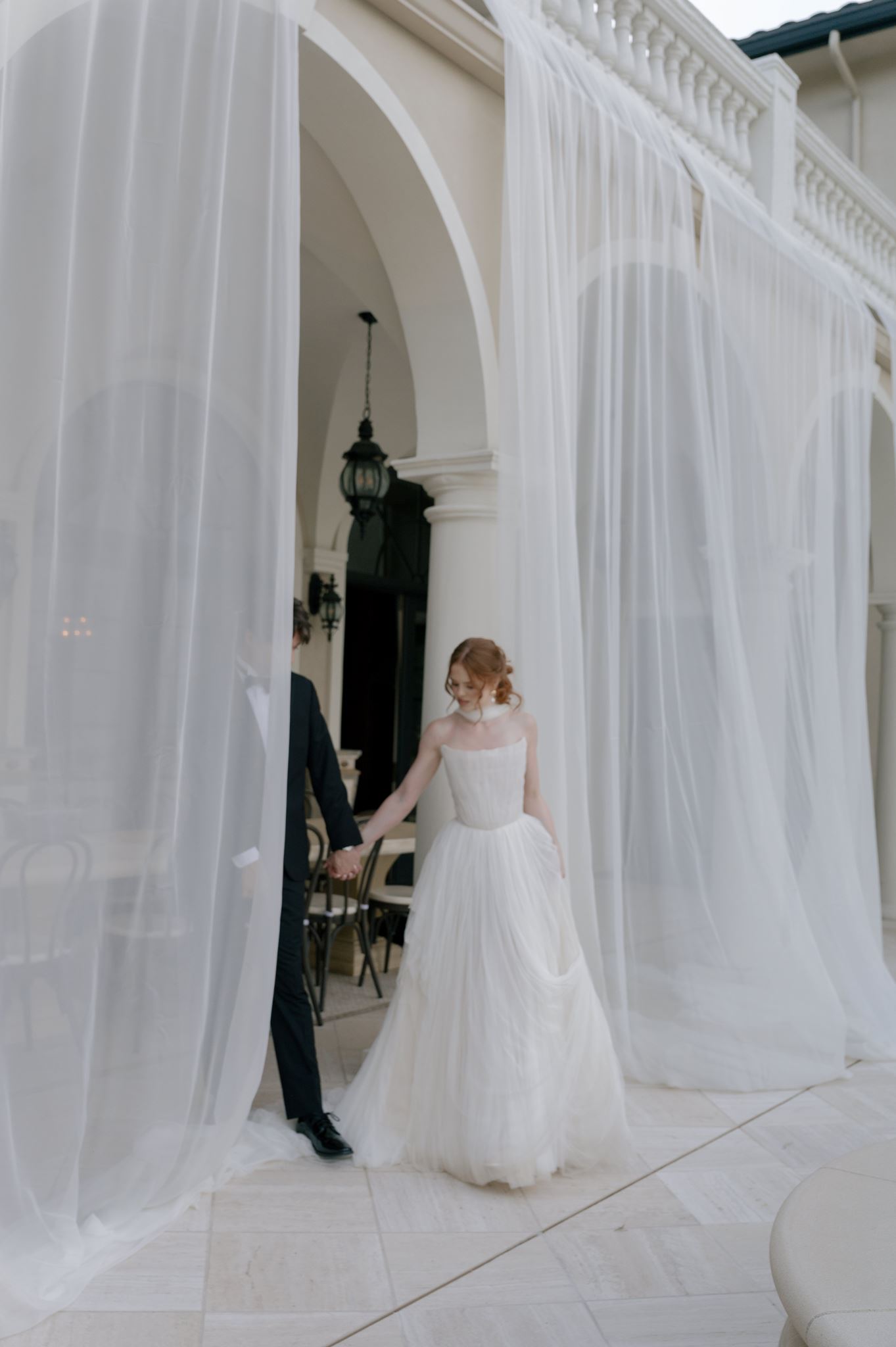 Bride and groom entering their cake cutting