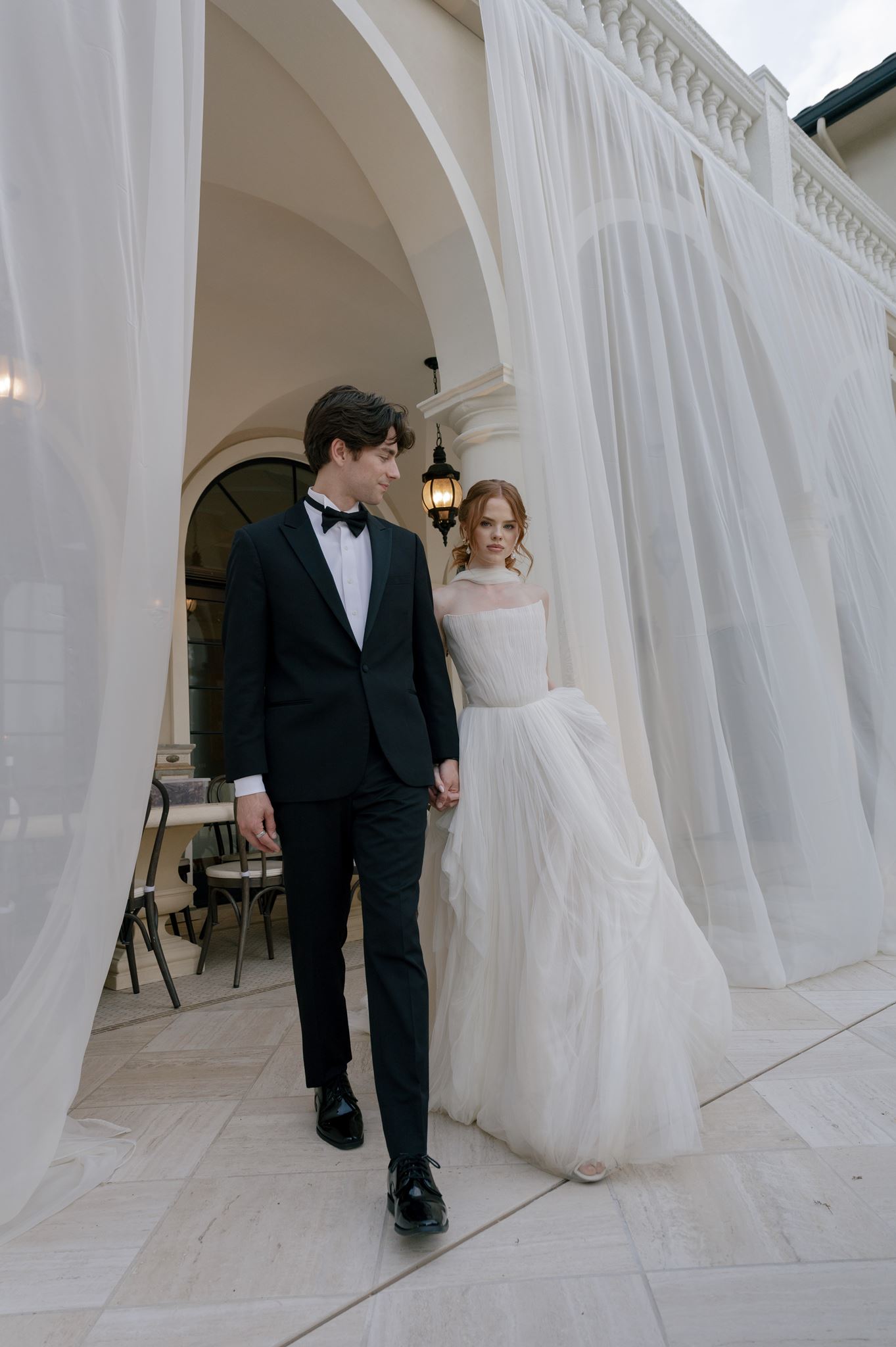 Newlyweds celebrating at a mansion wedding venue